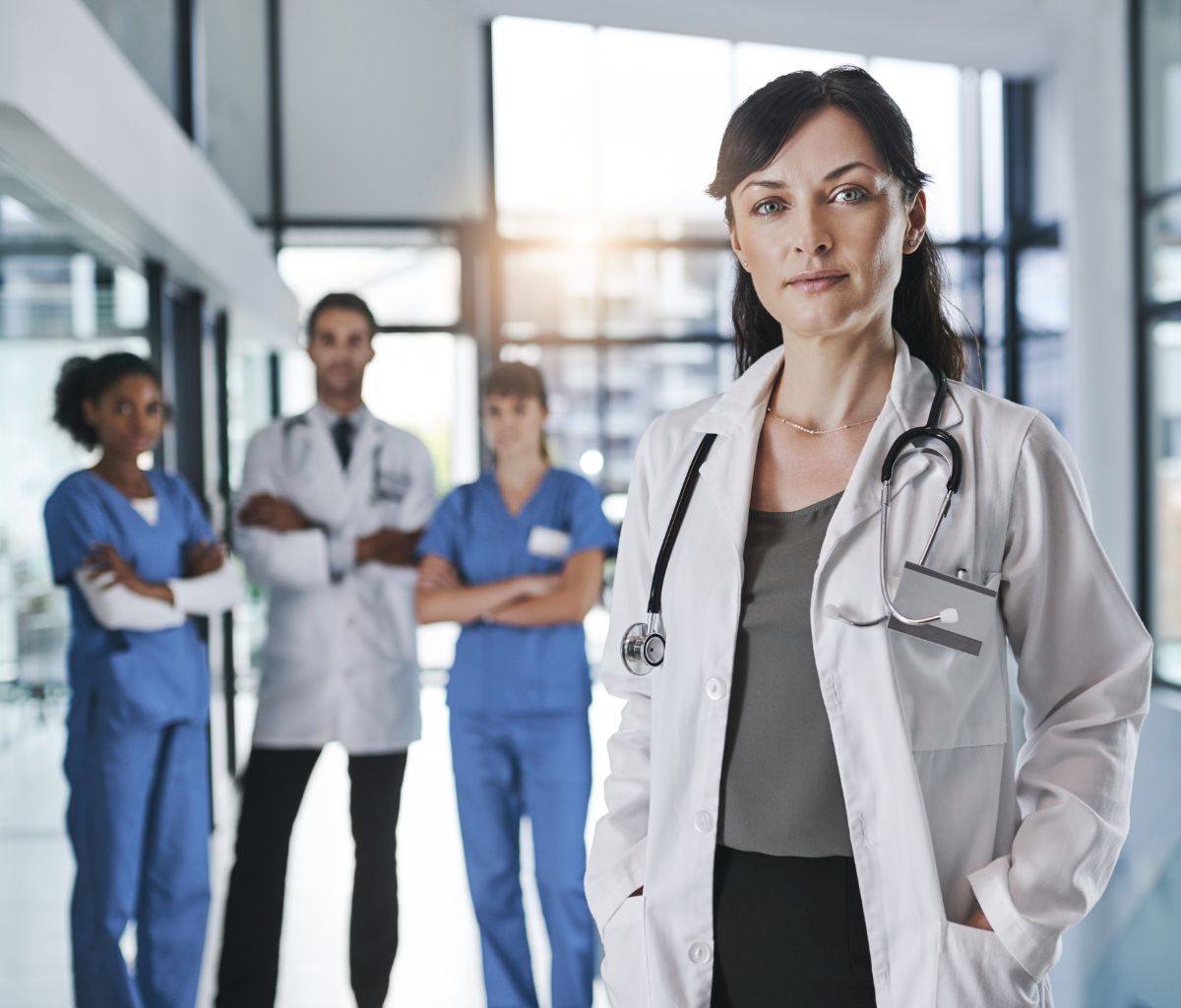 Healthcare professionals in a modern hospital setting.